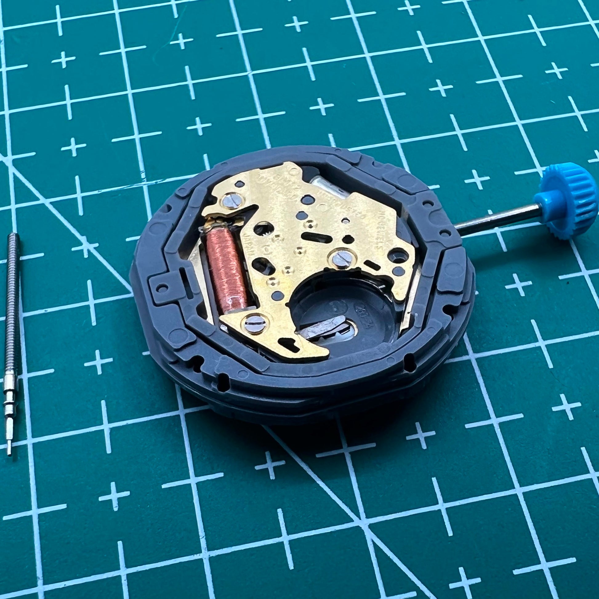 Miyota 6M12 Japan quartz movement with date at 3 o'clock, precise 3-hand watch mechanism.