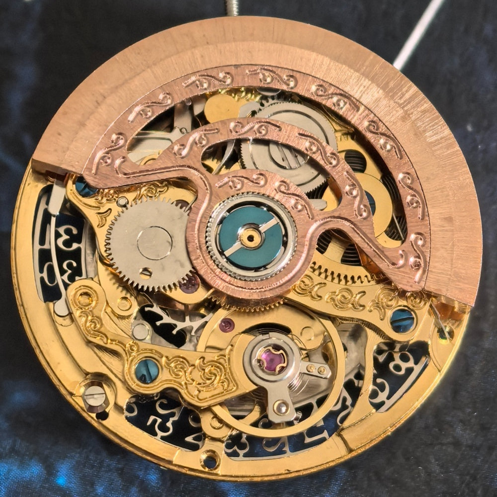 Chinese Hangzhou 2189 golden hollow watch part with detailed single calendar mechanical movement.