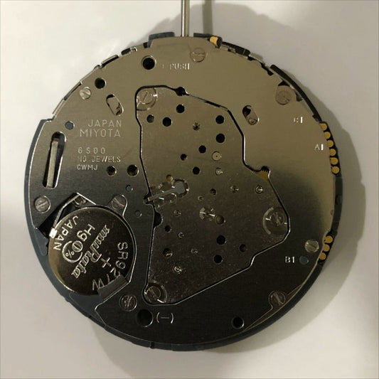 Japan-made Miyota 6S00 quartz movement watch part with 6 hands and day-date display.