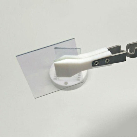 Wide headed PTFE tweezers, acid and alkali resistant, reverse self-locking for secure handling.