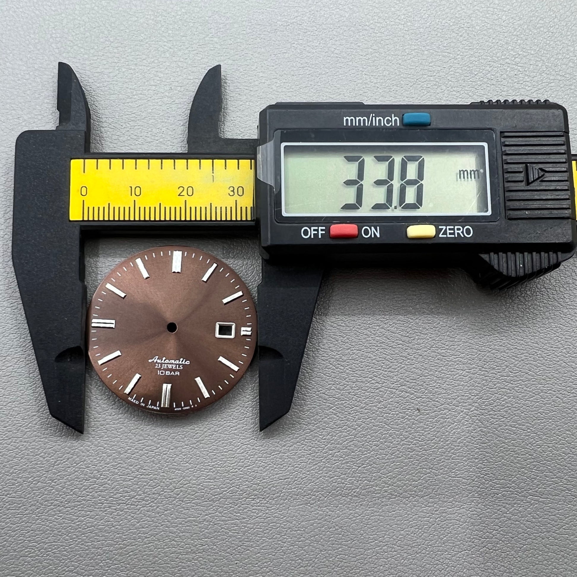 Silver nail-style markers on modified brown 34mm watch dial, compatible with NH35 NH36 movements.