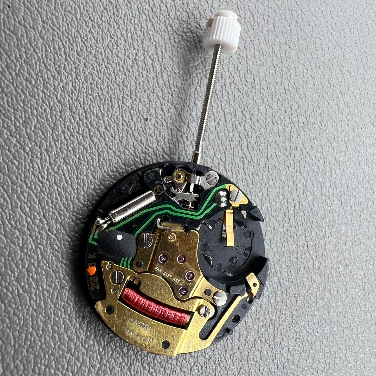 Swiss ISA 338 quartz watch movement with date at 6 o'clock and three hands, ideal for watch accessories.