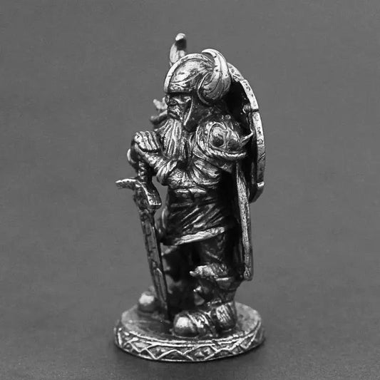 Vintage Viking Swordsman bronze figurine with silver and copper accents, hand-carved collectible trinket.