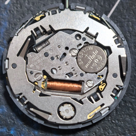 Japan Made Miyota 6N30 quartz watch movement with 3 hands, no calendar, precision timekeeping part.