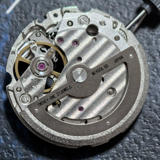 Japan-made Miyota 82S5 mechanical watch movement part for precise timekeeping in watch accessories.
