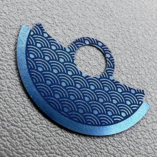 Blue waved metal oscillating weight overlay for Miyota 9015 watch movement, enhancing style and function.