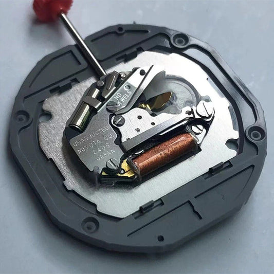Japan-made Miyota 2405 quartz watch part with double calendar for precise timekeeping and date display.