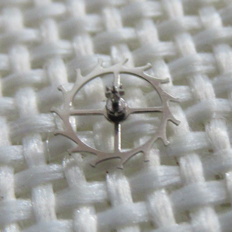 Escape wheel for movement 46945#705, generic fit watch part enhancing precision and durability.