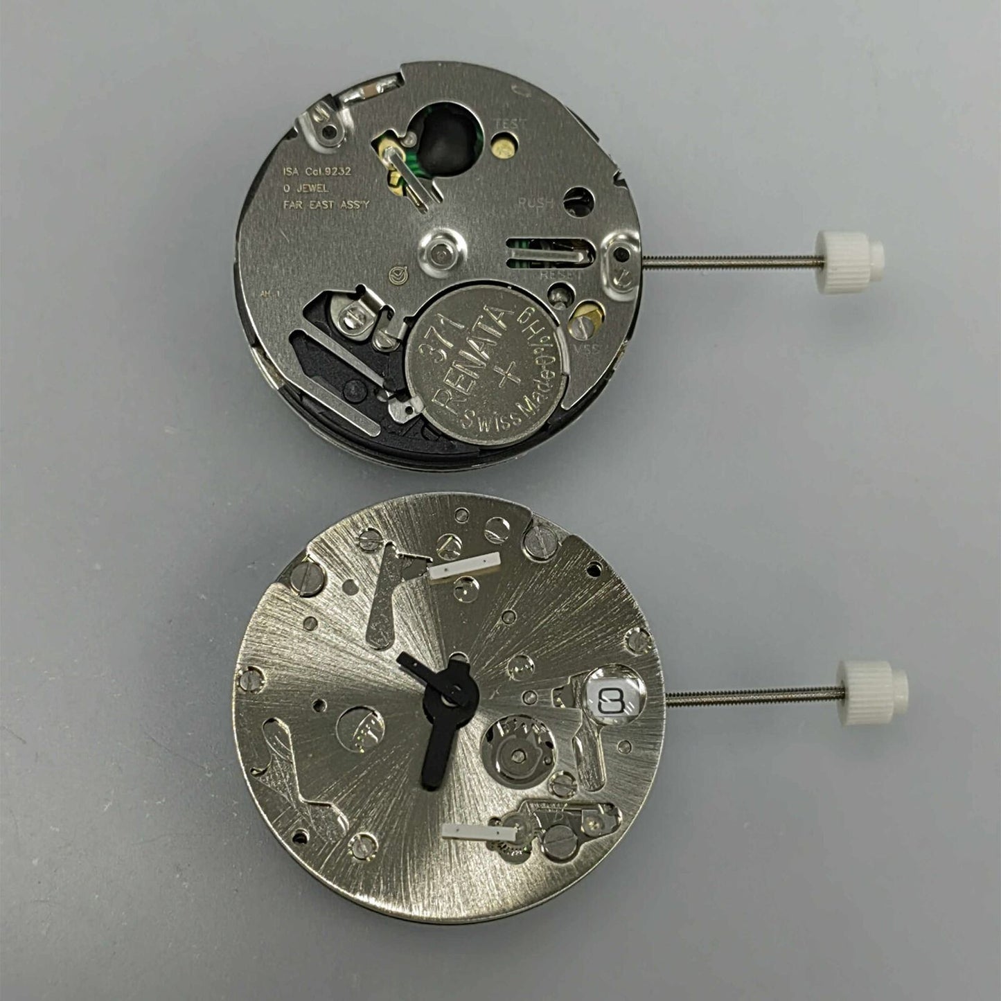 Watchmakers ISA 9232 quartz watch movement with 3 hands and date at 3, repair part by ISA.