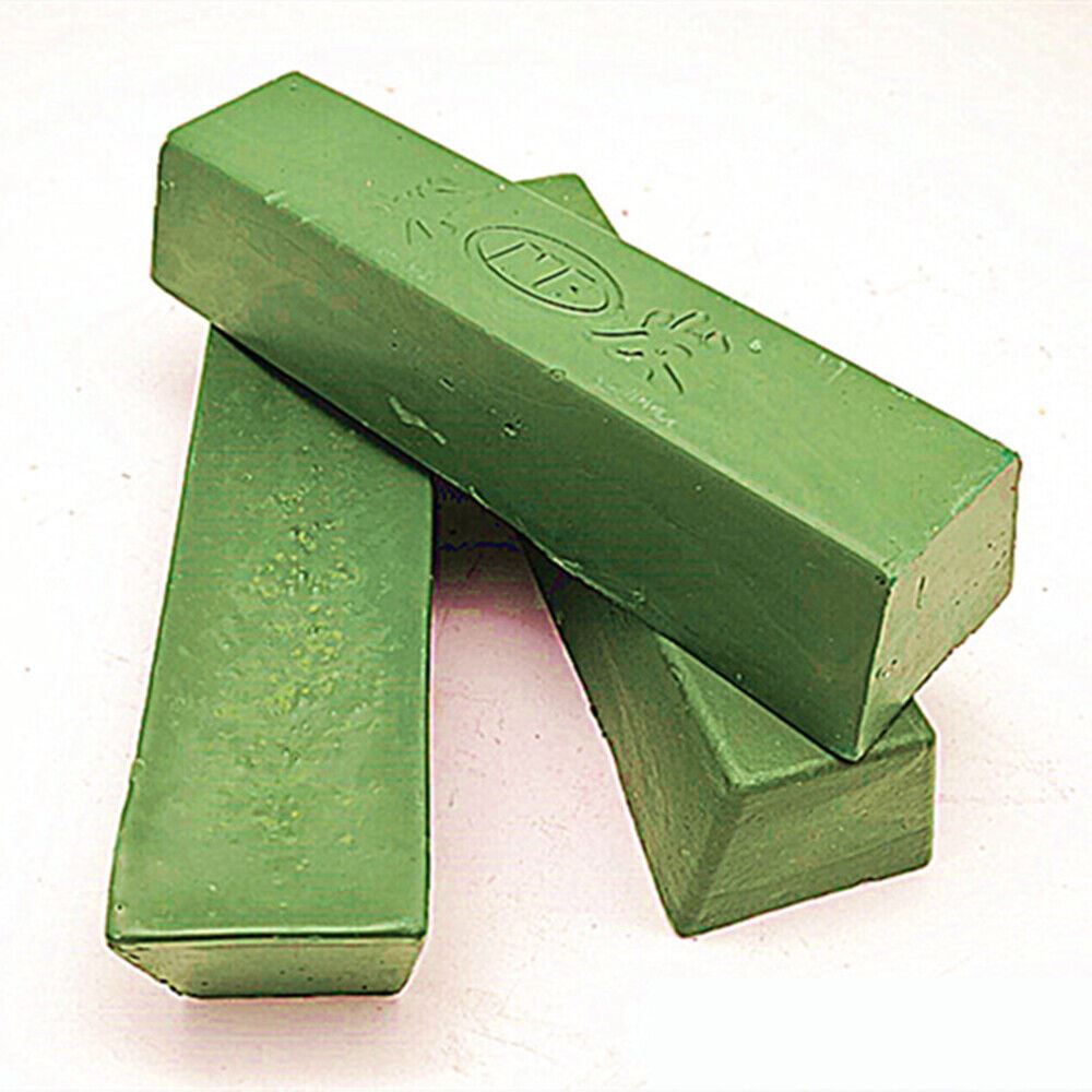 Green stainless steel polishing compound, perfect for jewelry and watch repair, restoring shine and removing tarnish effectively.
