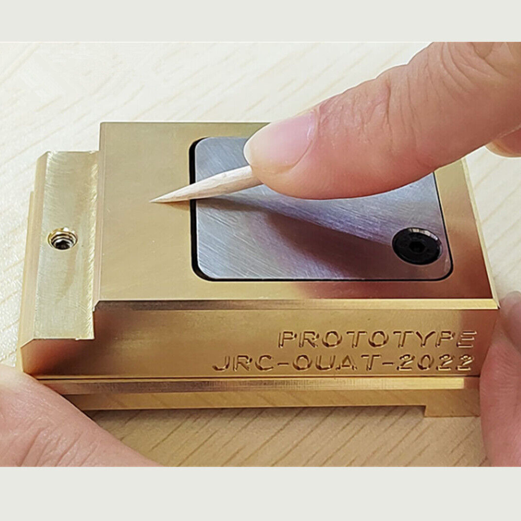 Brass and stainless steel Woodcutter pegwood tool for precise watch cleaning and repair.