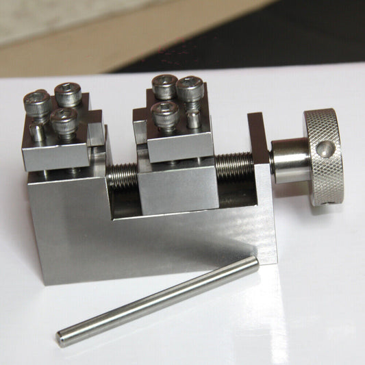 Stainless steel Oyster style link remover tool for precise watch band adjustments.