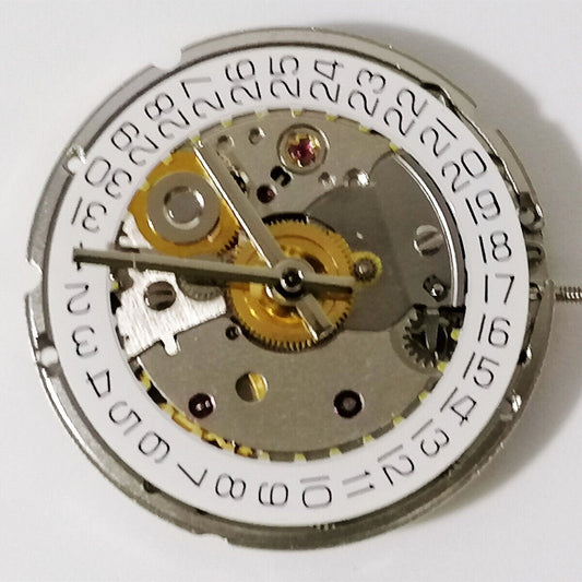 Chinese Tianjin Seagull mechanical watch movement with black balance wheel and single calendar display.