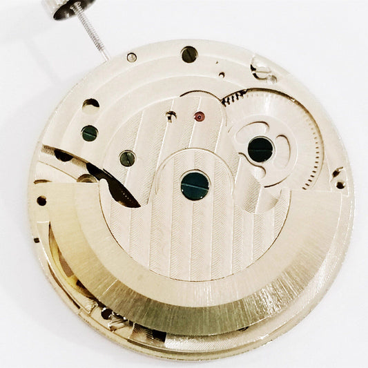 Dandong Silver carved automatic watch with mechanical movement and hollow design, stylish accessory.