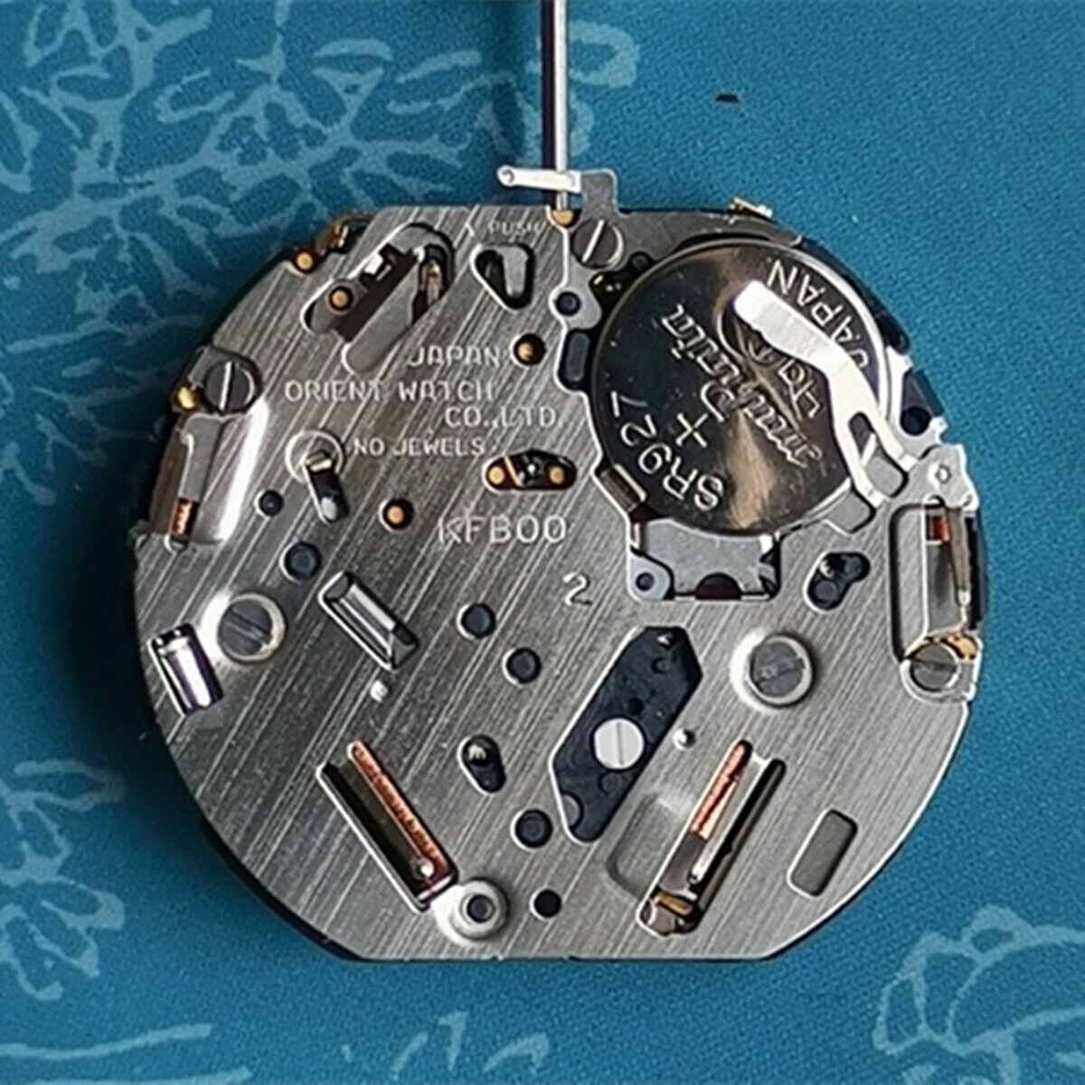 Orient KFB00 white date disk replacement for Japan-made quartz watch movement at 3 o'clock.