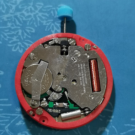 Genuine Original ISA 1198 quartz watch movement with golden disk, vintage stock by ISA brand.