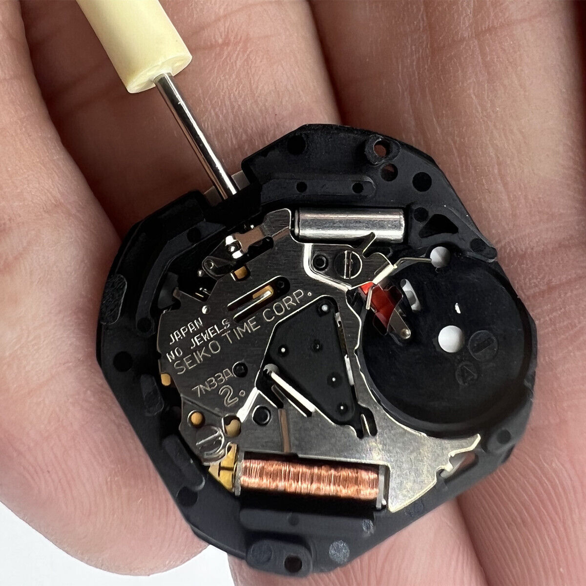 Original Japan 7N33 Quartz watch movement with double calendar and golden disk, vintage Seiko accessory for repairs.