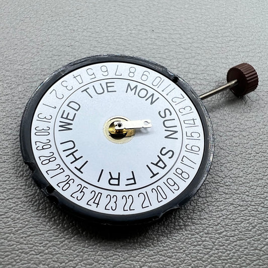 Swiss Ronda 517 quartz watch movement with day and date display at 6 o'clock, precise timekeeping.