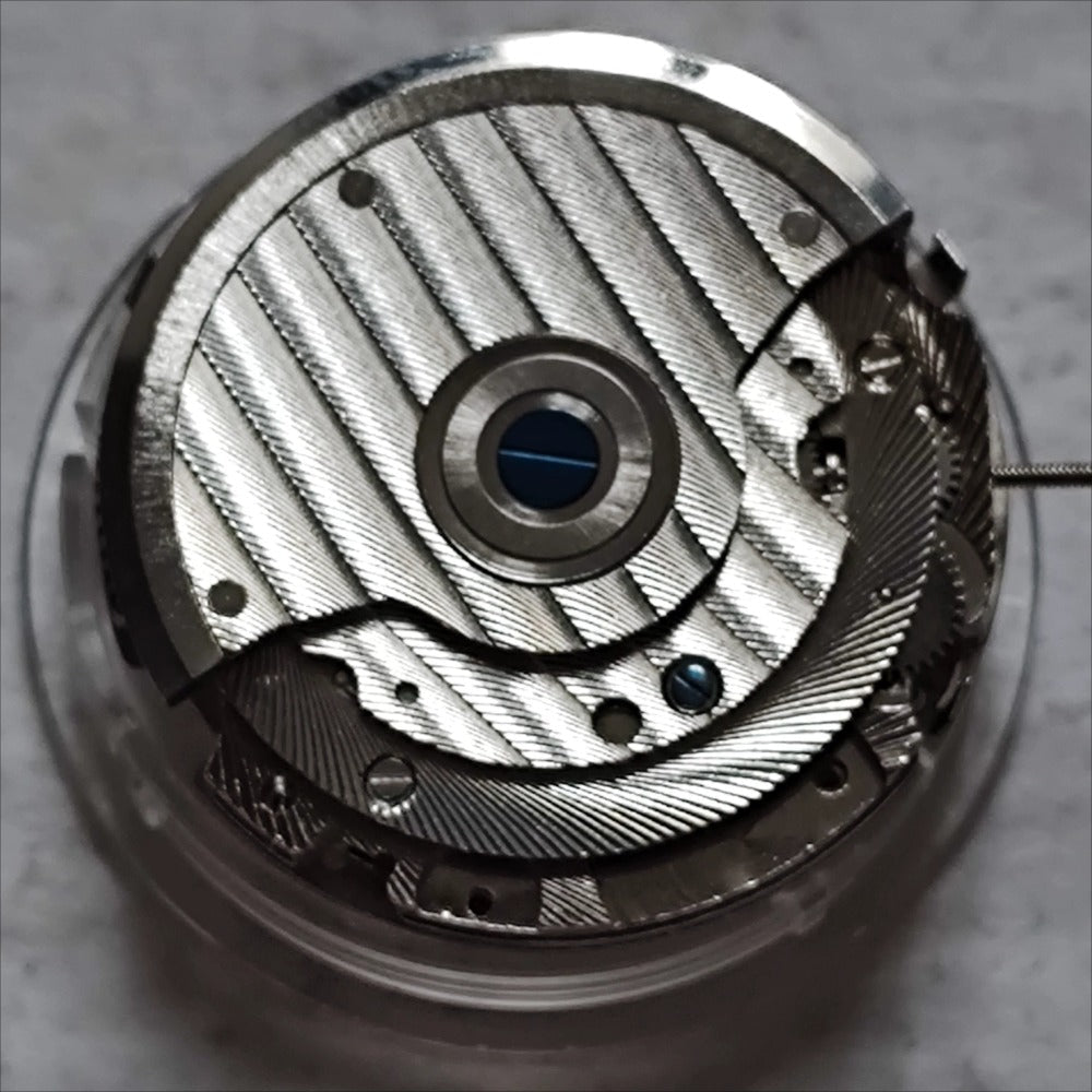 China Made Wenzhou Mechanical Movement Big Date At 12 Bare Balance Wheel At 6