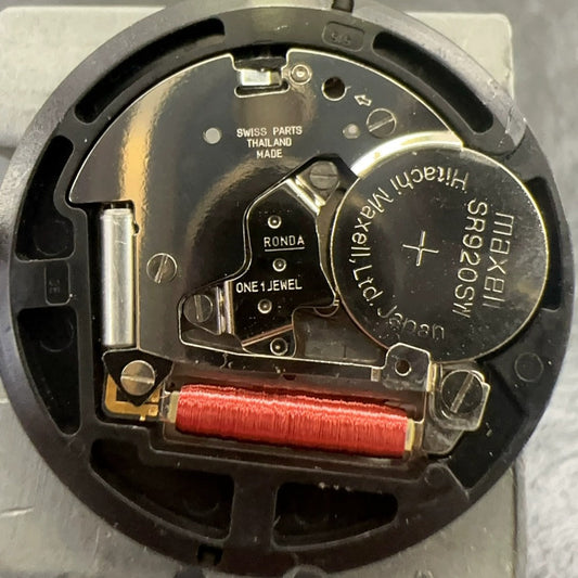 Swiss Made Ronda 515 quartz watch movement with black disk date display at 6 o'clock, 3 hands design.