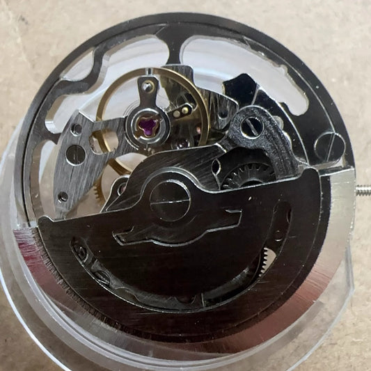 China Made No Calendar Silver 7120 watch part with mechanical movement and 3 hands for repairs or customization.