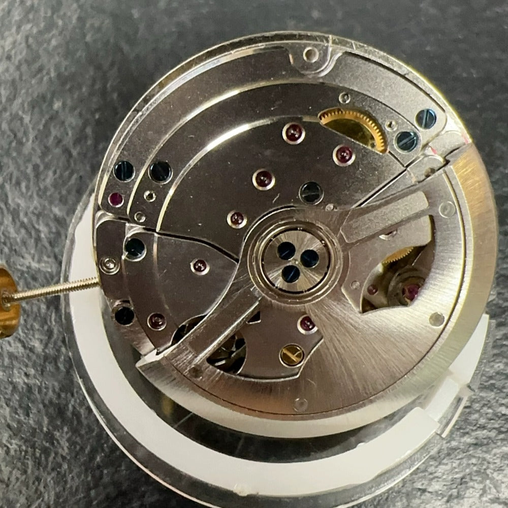 SL4801 mechanical watch movement by China Made, precision-modified to replace 4130 for enhanced performance.