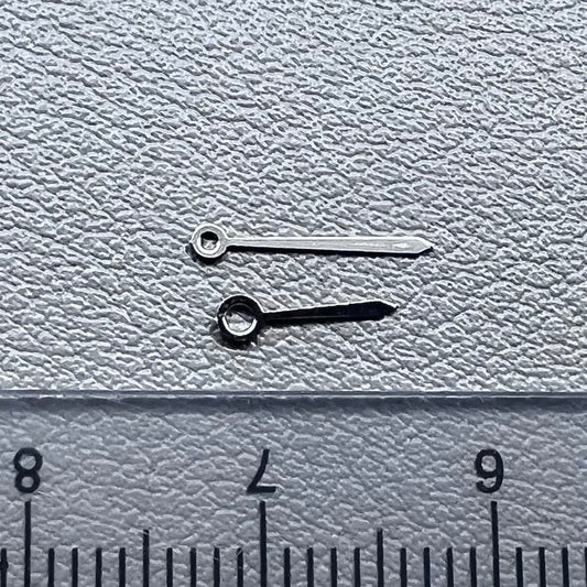 Set of 2 silver 10x7mm watch hands for Ronda 763/762/751/1062/1063 movements, perfect for repairs.