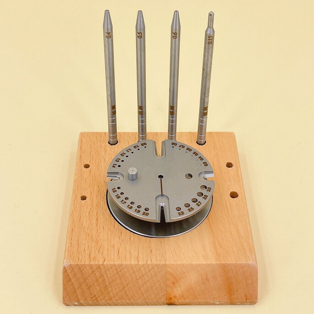 Precision China-made watch balance staff removal tool with balance wheel and hairspring installation.