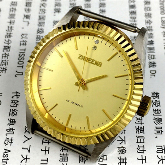 Round golden dial manual mechanical watch by Tianjin Factory, China-made with classic design and precise craftsmanship.