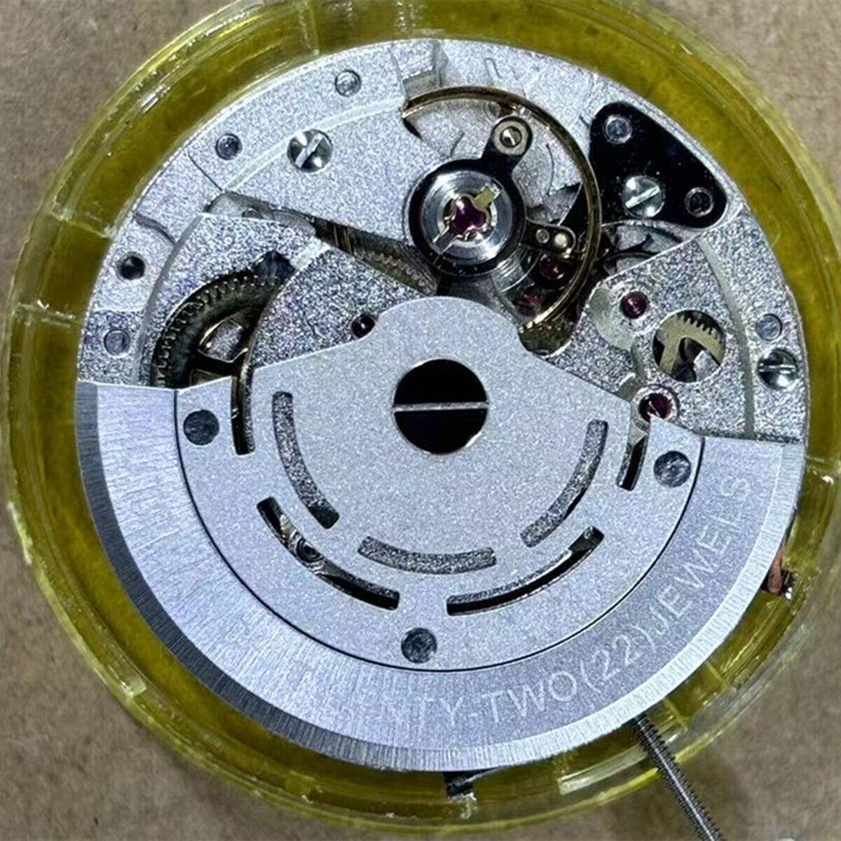 Mingzhu 2813 automatic watch movement showing precise single calendar function and Chinese engineering.