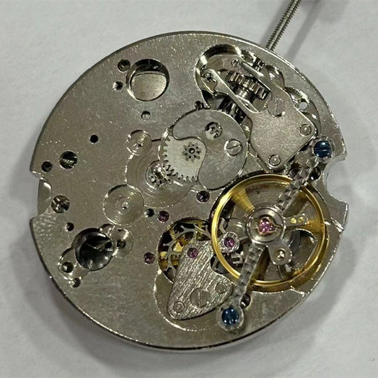 China-made 2 hands automatic watch with mechanical movement and visible bare balance wheel at 6 o'clock.