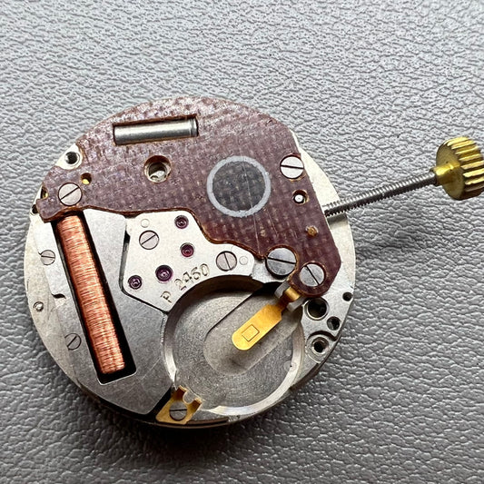 Swiss P-2460 quartz watch movement with 3 hands, precise timekeeping for watch repairs and accessories.