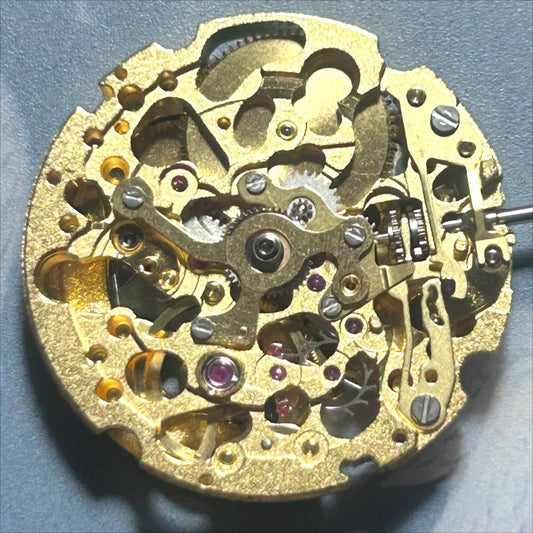 Miyota Golden+Silver 8N24 automatic watch movement showcasing precise Japanese craftsmanship.