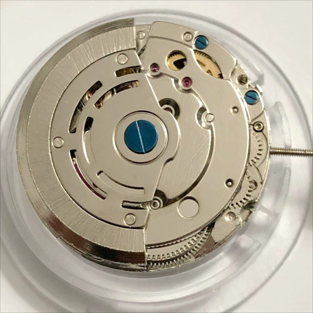 Close-up of New China Made NN2813 automatic mechanical watch movement showcasing precision gears and rotor assembly.