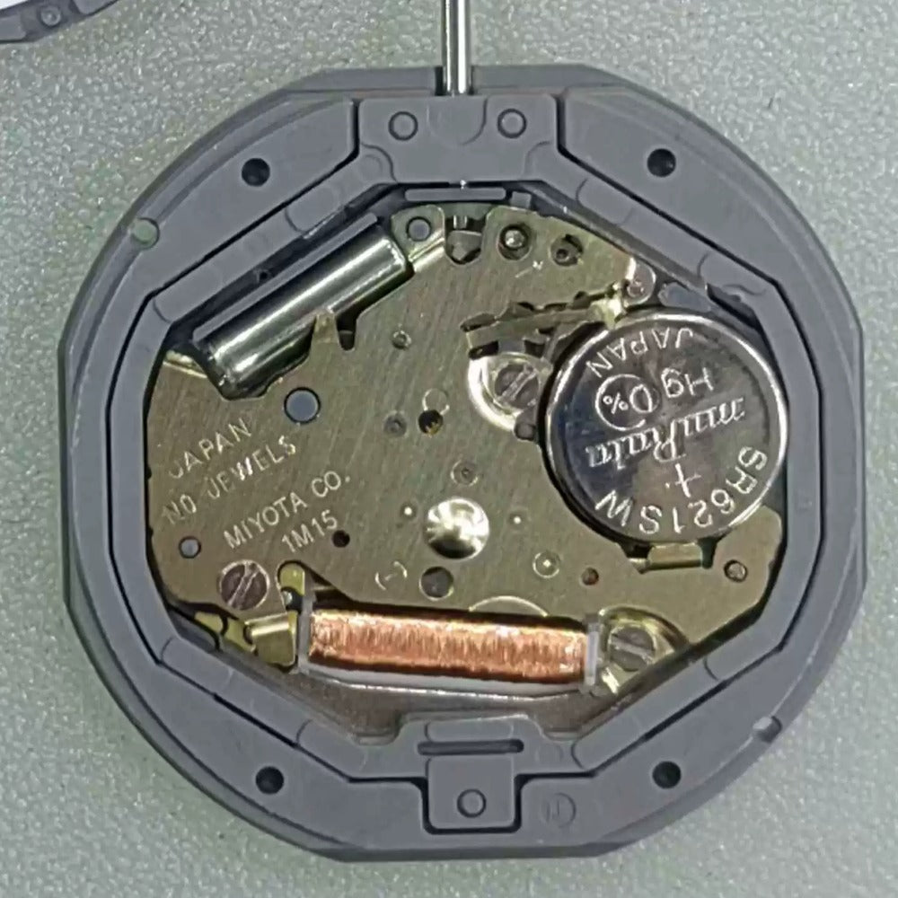 Japan-made Miyota 1M15 quartz watch movement with 2 hands and date window at 3 o'clock for precise timekeeping.