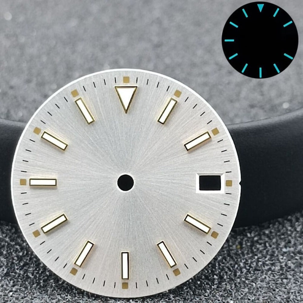 28.5mm silver watch dial with blue luminous markers and golden nails, calendar feature for NH35 movement.