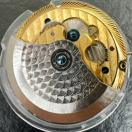 Shanghai watch accessories featuring automatic mechanical movement with golden six hands and small seconds at 3, 6, and 9 positions.