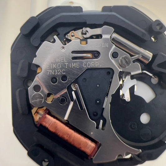 Epson 7N32 quartz movement with date at 3 for precise watch repair and replacement.