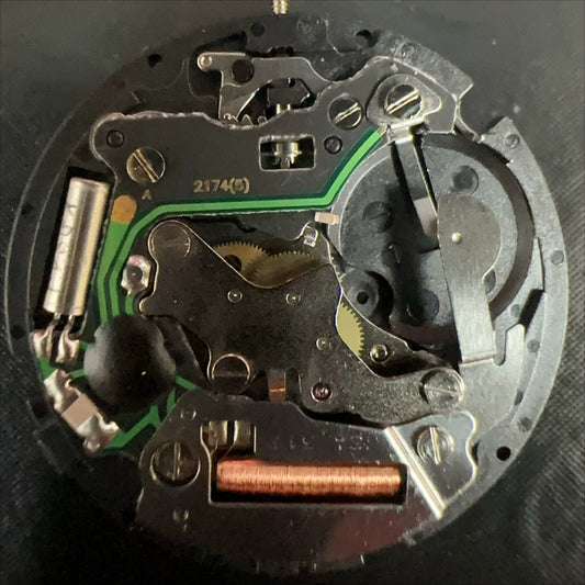 Swiss Made ISA 317 quartz watch part with double calendar and three hands for precise timekeeping.