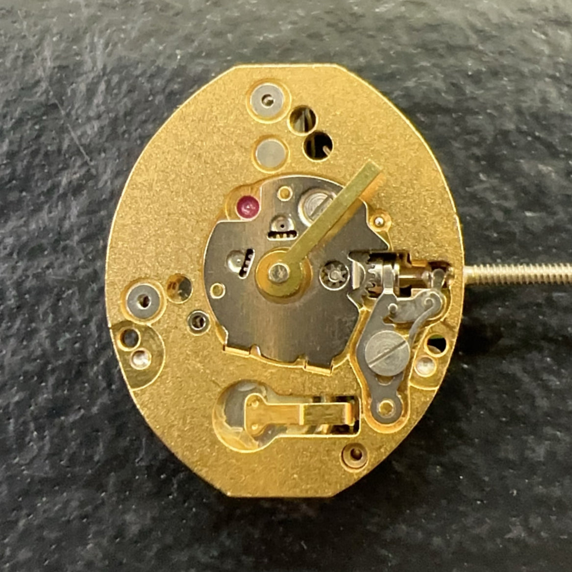 Swiss Made ETA980.003 quartz movement black circuit board for precision watch repair.