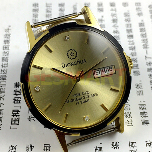 Chinese Qionghua manual mechanical watch with 17 jewels, golden dial, double calendar display for precision.