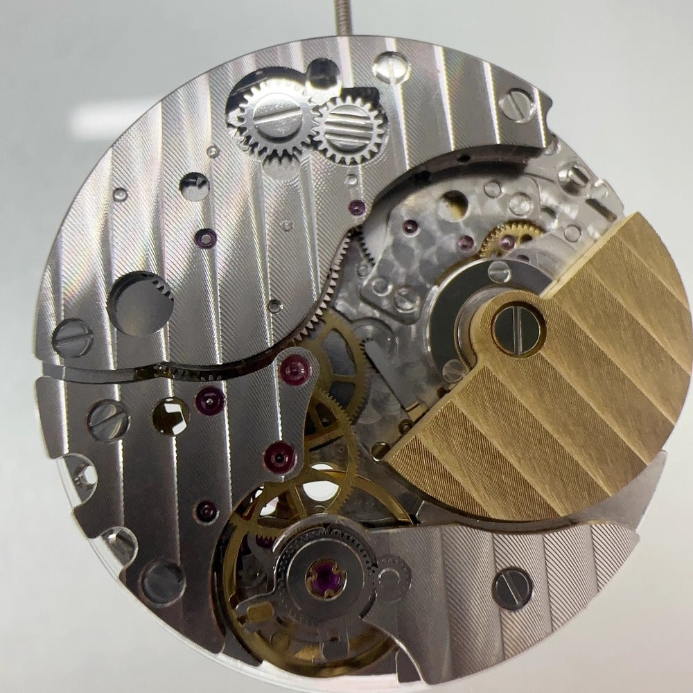 China Made 5100A automatic watch movement with 3 hands and single calendar, precise mechanical part.