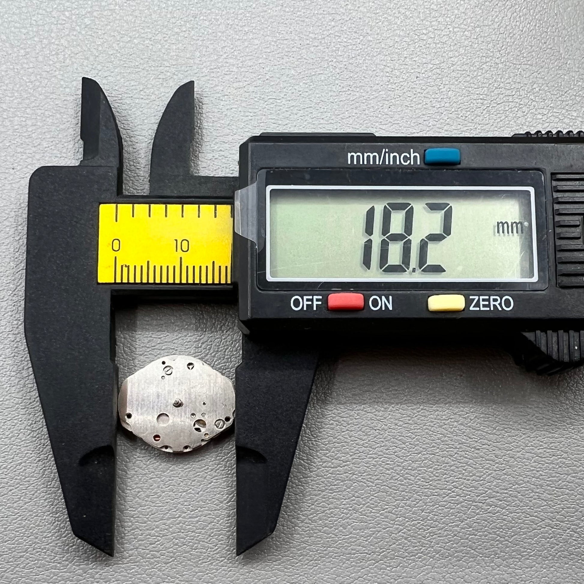 Japan Morioka Tokei V252A quartz watch movement with 2 hands and small second, precise timekeeping.