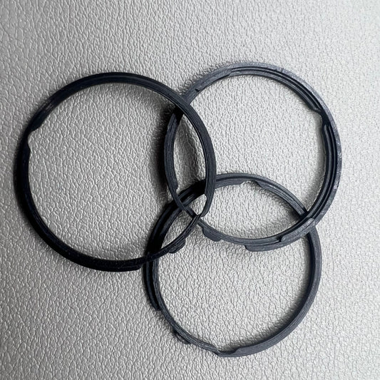 Set of 5 black cushion mount spacer rings by Orient for 46941 watch movement adjustment