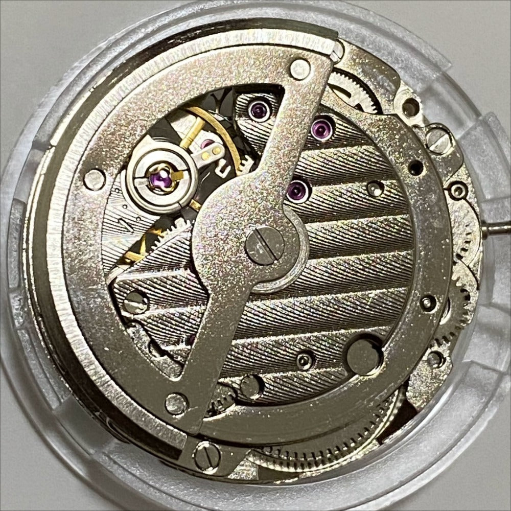 China Made 8205 2813 mechanical watch movement with 4 hands, small second at 4.5 position for precise timekeeping.
