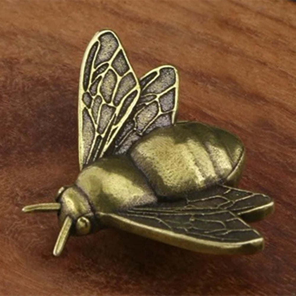 Solid copper vintage bee trinket with hand-carved details, rustic decor accent.