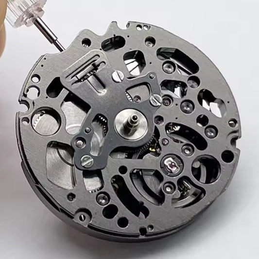 1. Black hollow watch accessory featuring Seiko SII NH72 automatic movement, Japan made.