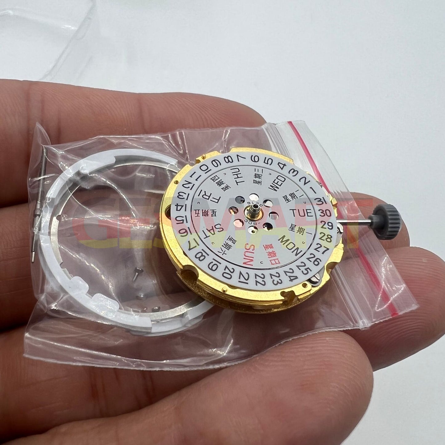 Golden Miyota Citizen 8200 automatic watch movement showcasing day and date functions in elegant design.