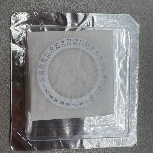 Original Swiss Omega 8500A Quartz movement date disk wheel for precise watch repair and maintenance.