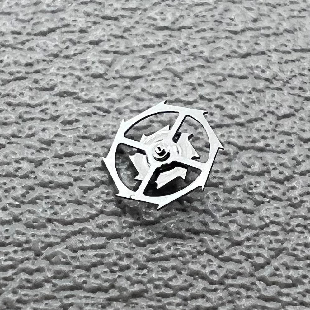 Pallet fork and escape wheel set for Omega 8500A movement, ensuring precise timekeeping and durability.